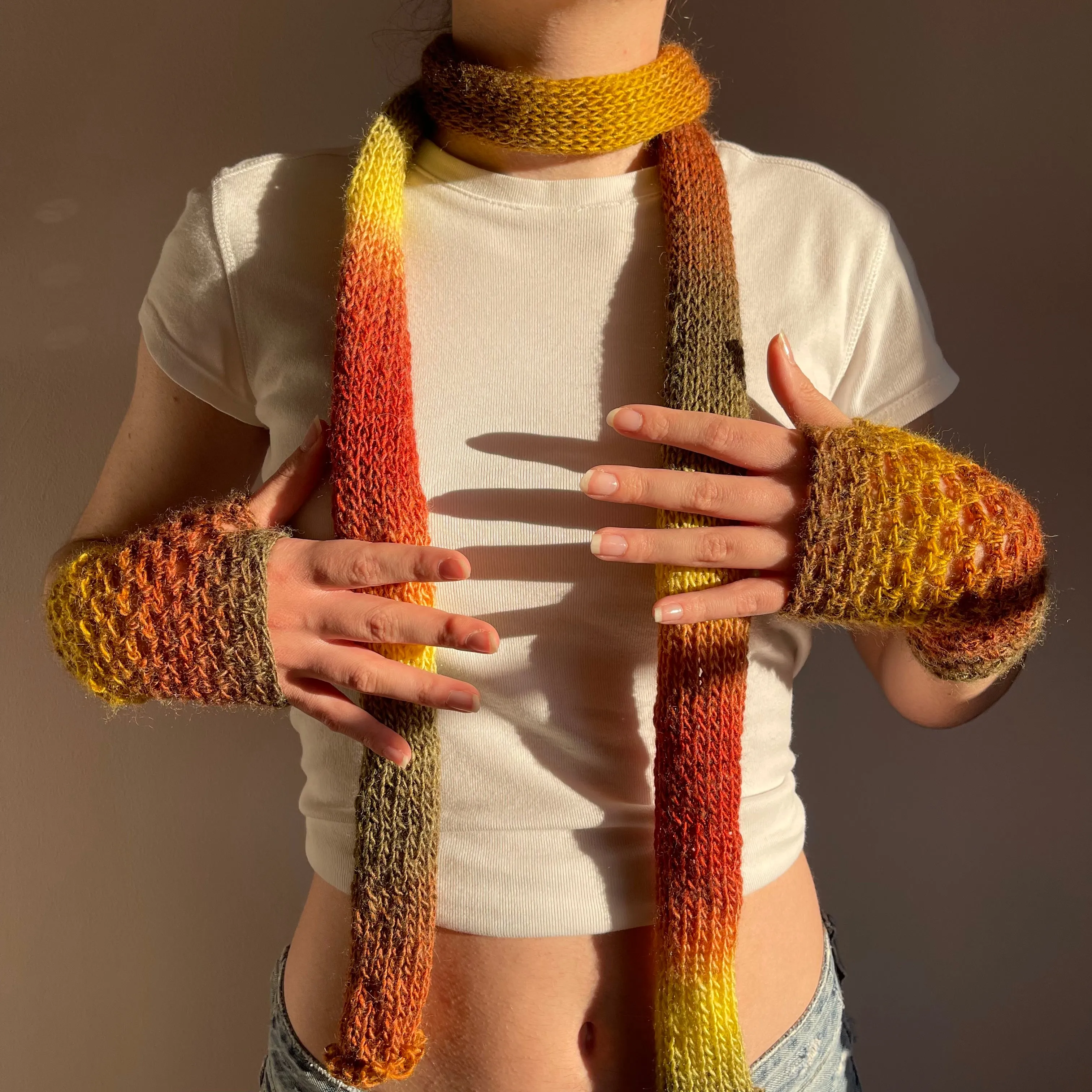 Handmade knitted ombré skinny scarf in earth tones