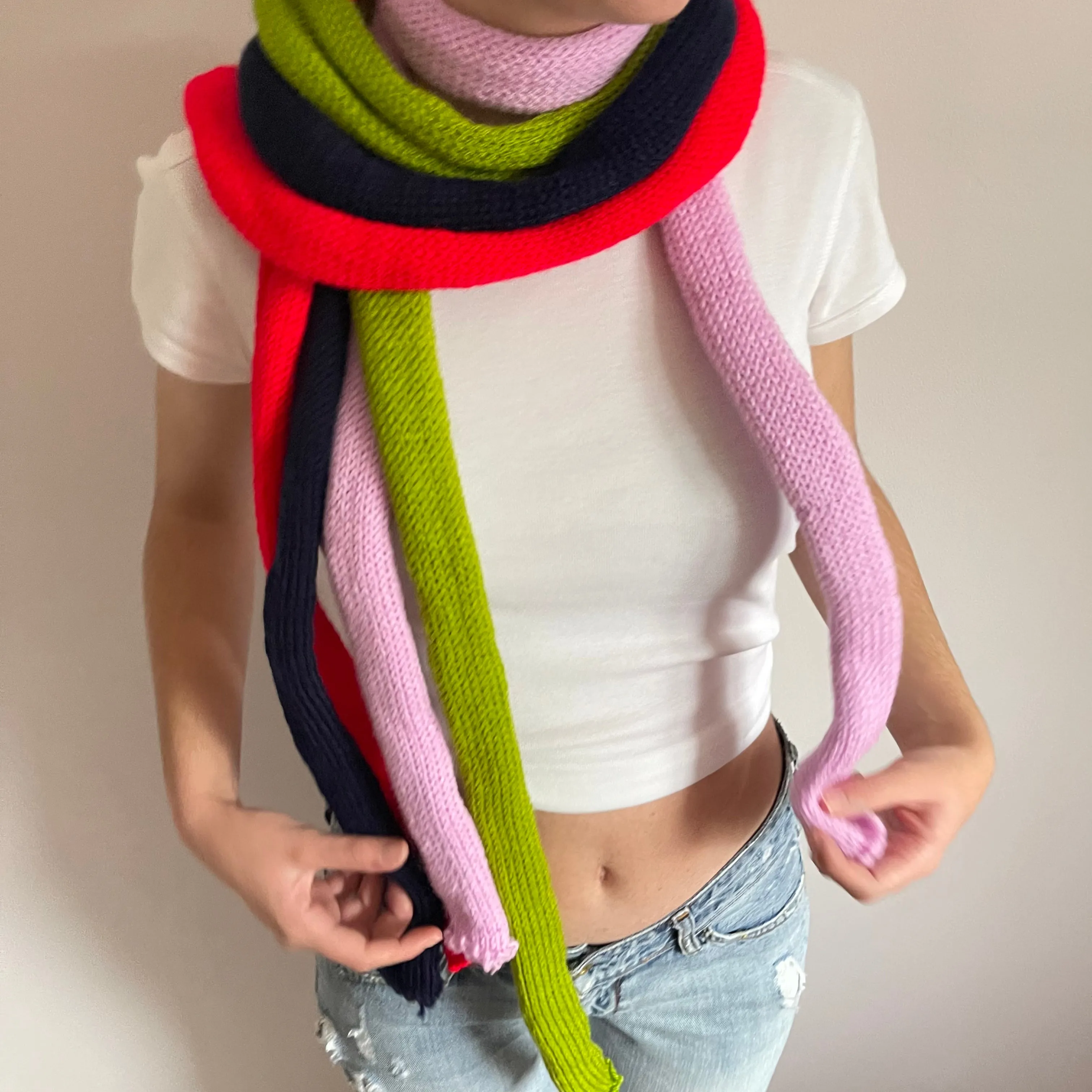 Handmade knitted skinny scarf in baby pink