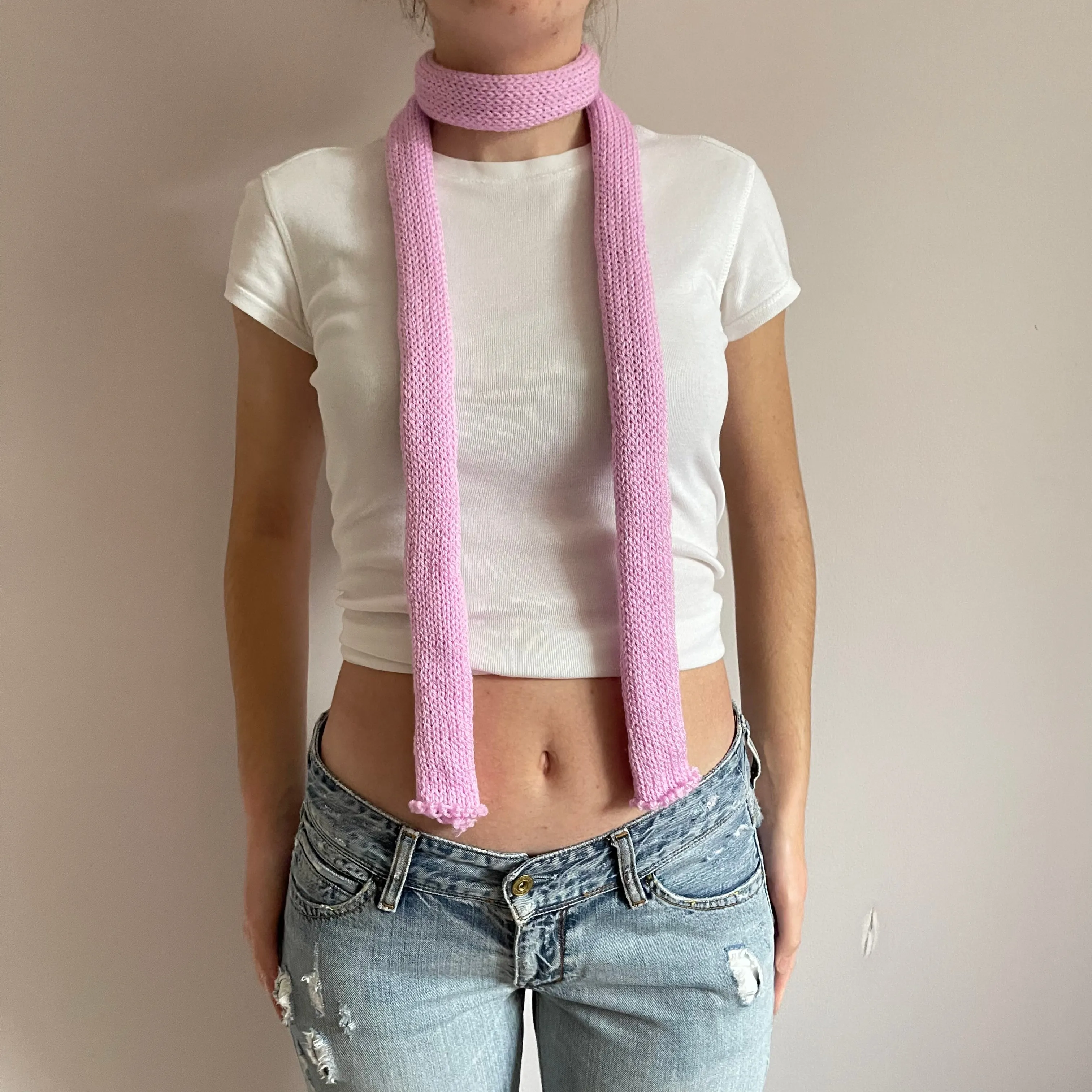 Handmade knitted skinny scarf in baby pink