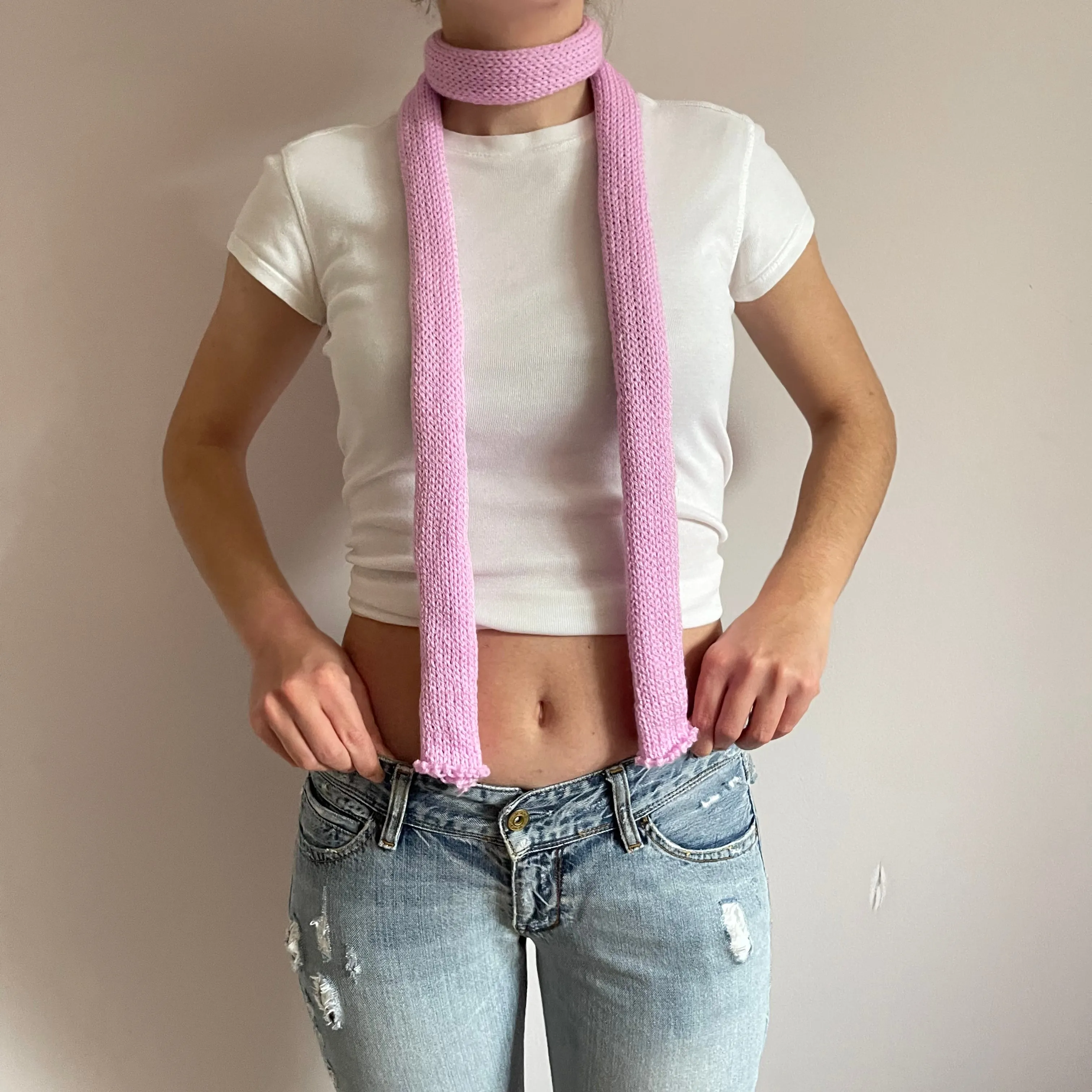 Handmade knitted skinny scarf in baby pink